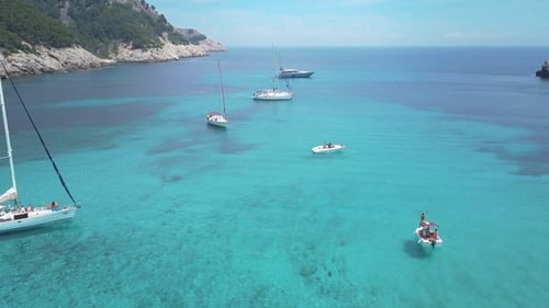 Amazing View To Yacht Sailing in Sea. Stock. Sunset View of the Yacht. Luxury Vacation on a Yacht