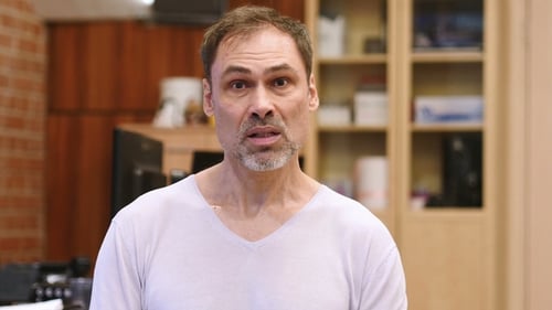 Man Talking Directly to Camera Indoors
