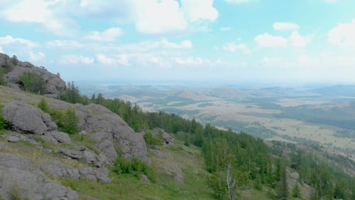 Aerial View. Flight Over a Greenrocky Hills. Bashkortostan, Bannoe, Russia