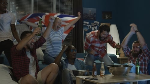 Friends Watch Sports Game Together in Apartment