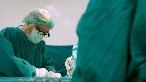 Team of Surgeons in Operating Theater