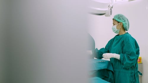 Team of Surgeons in Operating Theater.