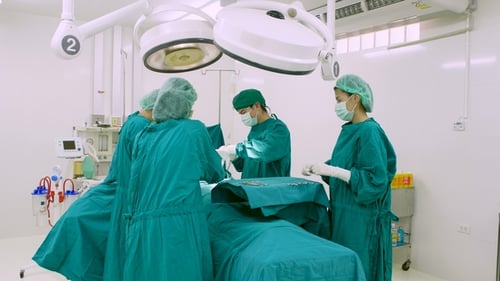 Team of Surgeons in Operating Theater.