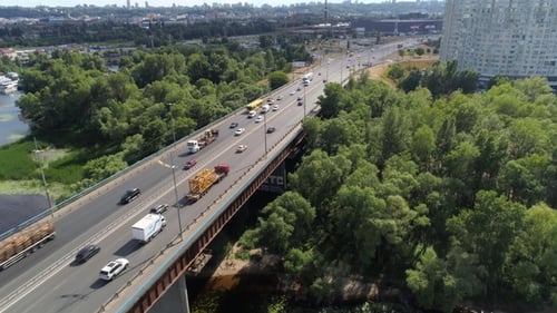 Flying Over Moskovskiy Bridge with Truck and Cars