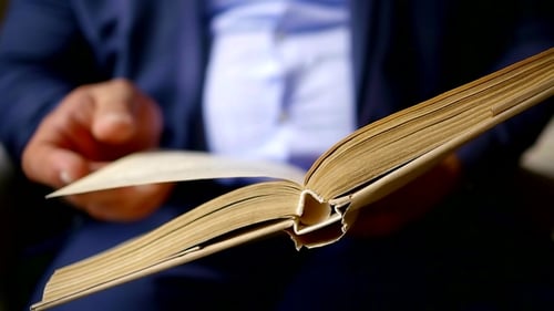 Adult Reading a Book