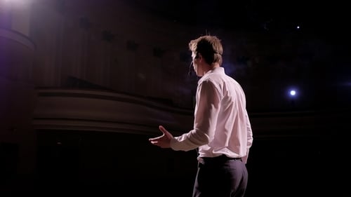 Speaker at Business Conference and Presentation. Audience at the Conference Hall. Person Says About