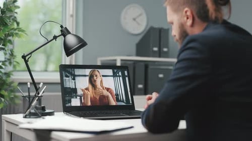 Man Using Laptop for Video Call