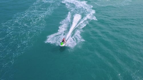 Aerial View of Jet Ski Riding in Sea