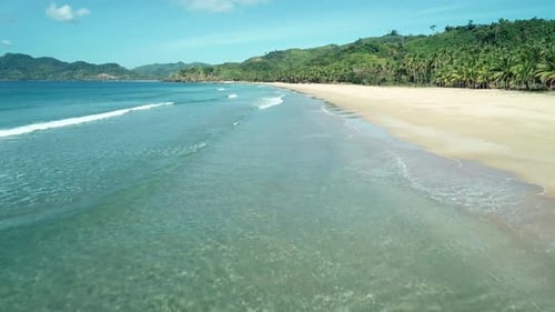 Aerial Drone View of Tropical Paradise Beach with White Sand and Turquoise Crystal Clear Sea Water