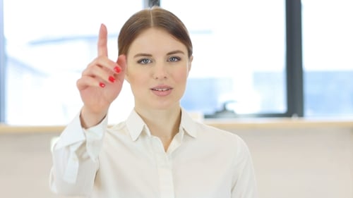 Pointing Toward Camera, Woman in Office