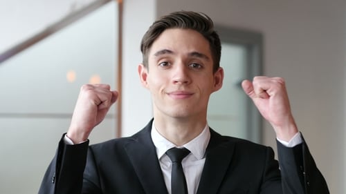 Young Businessman Celebrating Success