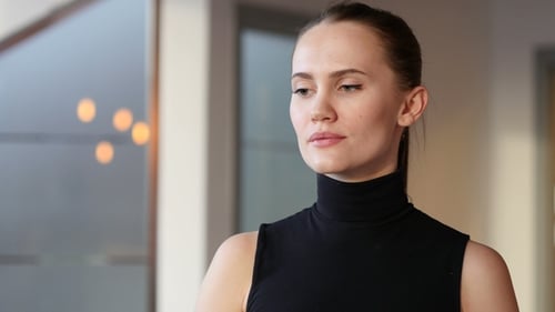 Young Woman Using Smartphone Indoors