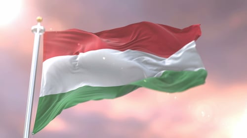 Waving Hungarian Flag Against a Beautiful Sky