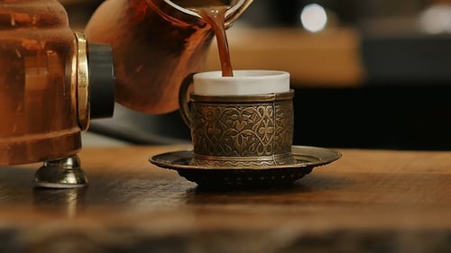 Coffee Being Poured Into Cup