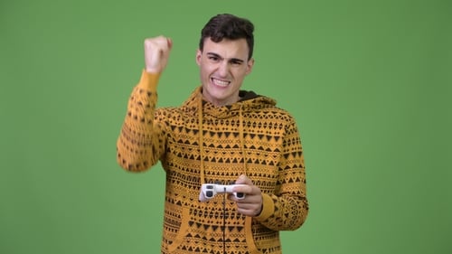Young Adult Playing Video Game on Controller
