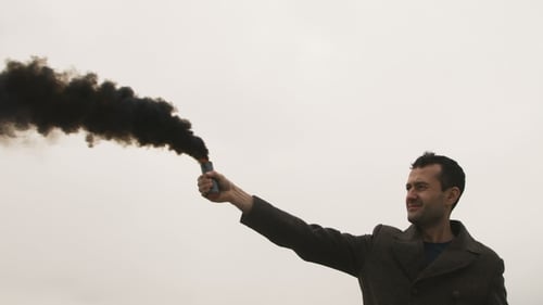 Serious Man Holding Smoke Bomb with Black Fume