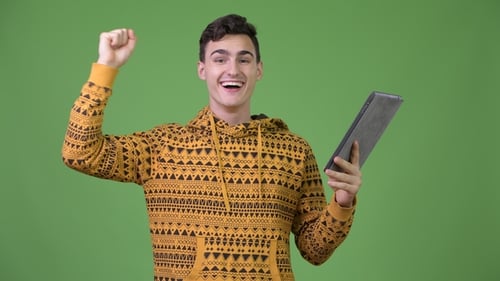 Young Adult Celebrates Tablet Victory