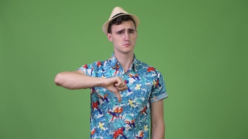 Young Adult Gives Thumbs Down Gesture