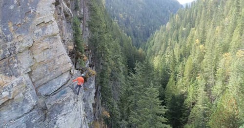 Climber Climbing Rocky Mountain