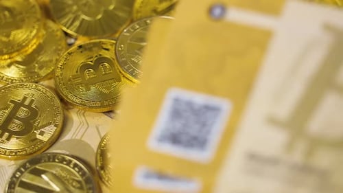 La monnaie numérique sur les bitcoins et les litecoins métalliques