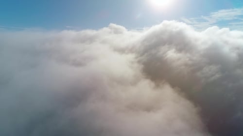 Scenic Aerial View Above White Fluffy Clouds