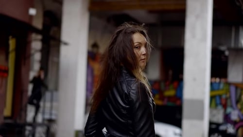 Girl Walks on Street of the Old Town. She Is in a Deep Non-specific Thoughts. Walking in a Nice Area