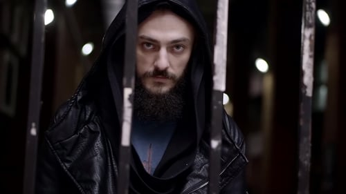Mysterious Man in Black Clothes with a Beard Comes To the Iron Lattice