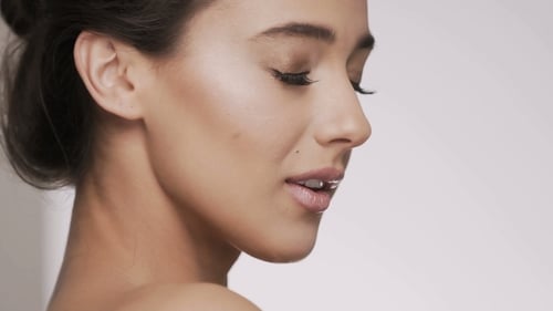 Attractive Brunette Model at Studio Background