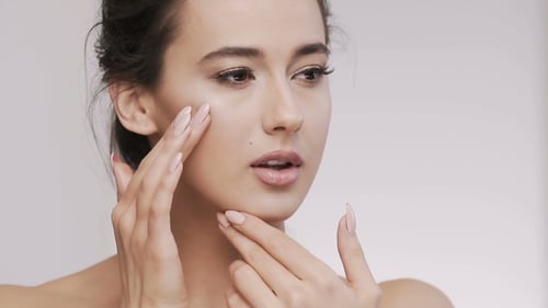 Attractive Brunette Model at Studio Background