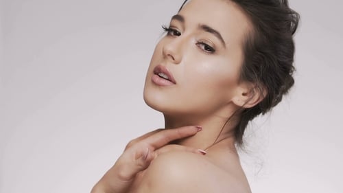 Attractive Brunette Model at Studio Background