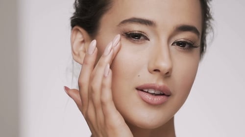 Attractive Brunette Model at Studio Background