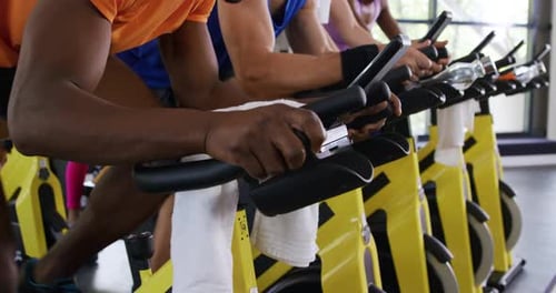 Working out on exercise bikes at a gym