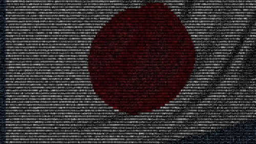 Drapeau ondulant du Japon fait de symboles textuels sur un écran d'ordinateur