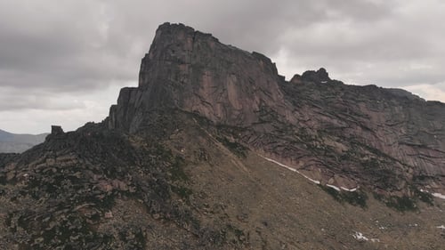 Flying Over the Mountain Gorge in the Siberian Nature Park Ergaki