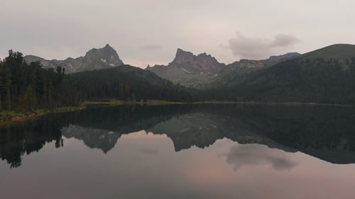Flying Over the Mountain Lake in the Siberian Nature Park Ergaki