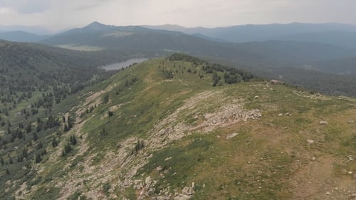 Flying Over the Mountain Gorge Near the Tourist Trail in the Siberian Nature Park Ergaki