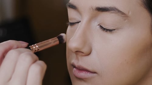 Applying Facial Makeup with Brush for Fashion