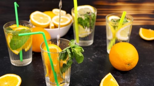 Refreshing Citrus Water with Straws and Mint