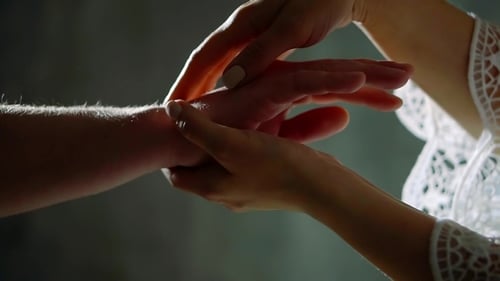 Close Up of Loving Couple Holding Hands