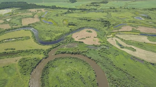 Flying Over the Beautiful River and Green Fields