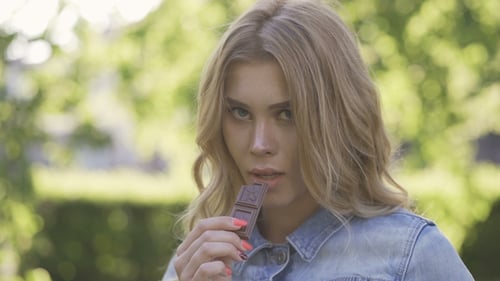 Girl Eating Chocolate