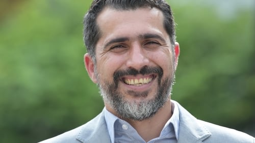 Man Smiling with a Beard in Natural Light