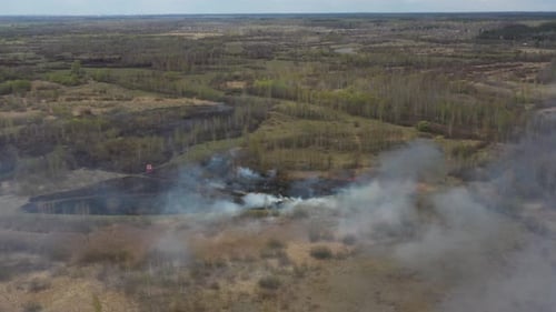 Aerial View Spring Dry Grass Burns During Drought Hot Weather