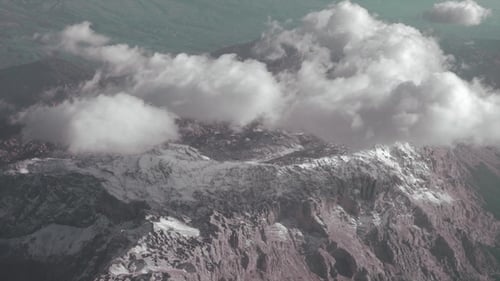 Aerial View of Mountains. Looking From the Flying Plane