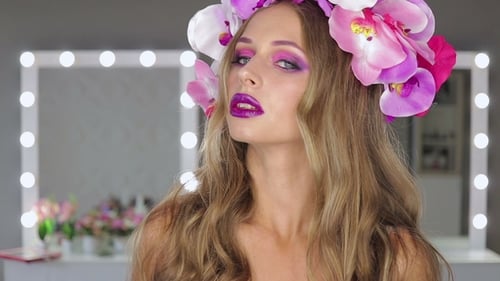 Woman with Flower Crown Posing Indoors