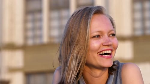 Smiling Woman Portrait Close Up in Golden Light