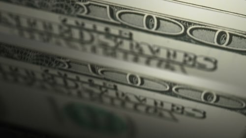 Counting Cash Hundred Dollar Bills with Depth of Field Seamless Animation