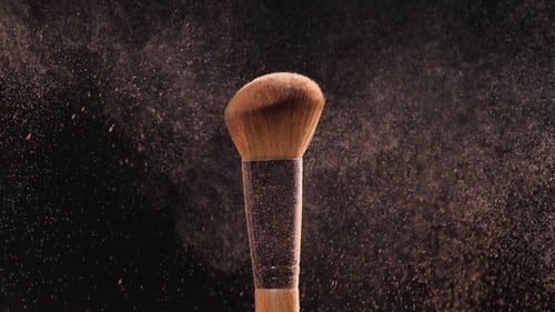 Makeup and Beauty Concept Makeup Brush with Orange Powder
