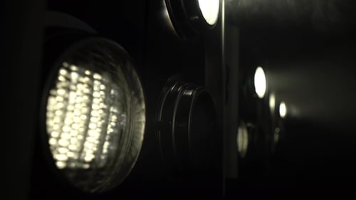 Row of Stage Lights Flickering with Smoke