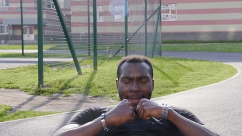 Black Man Doing Exercise on the Street